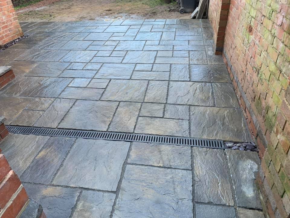 Close-up of completed stone slab patio